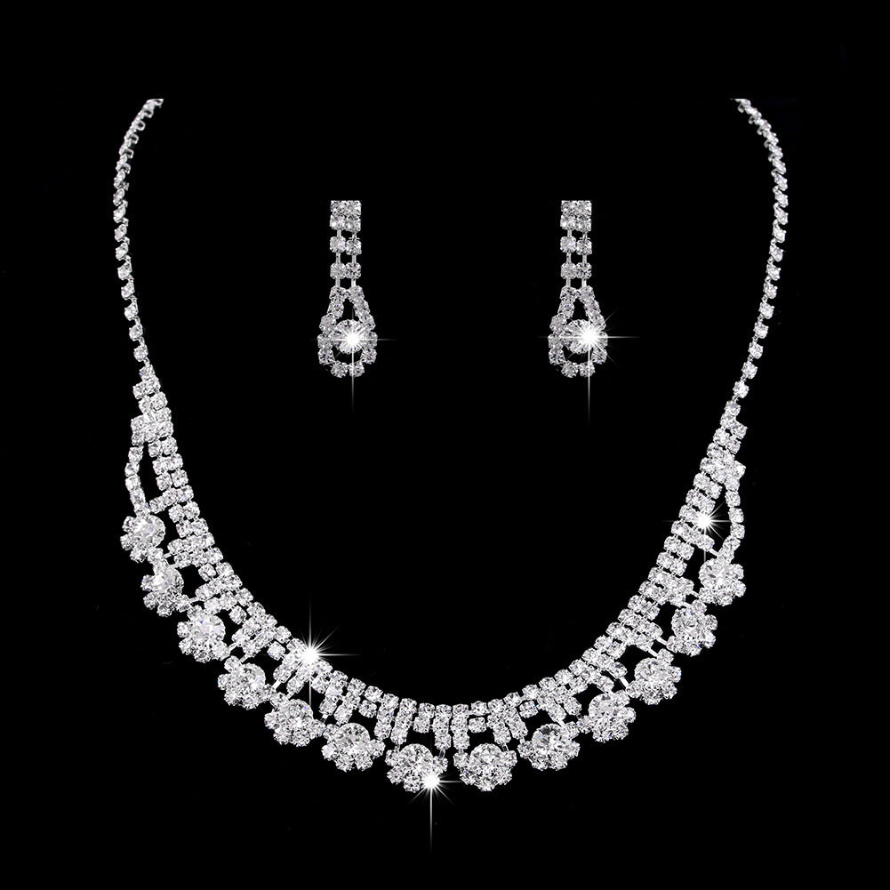 “Luminara Cascade – Rhinestone & Zircon Water Drop Necklace & Earrings”